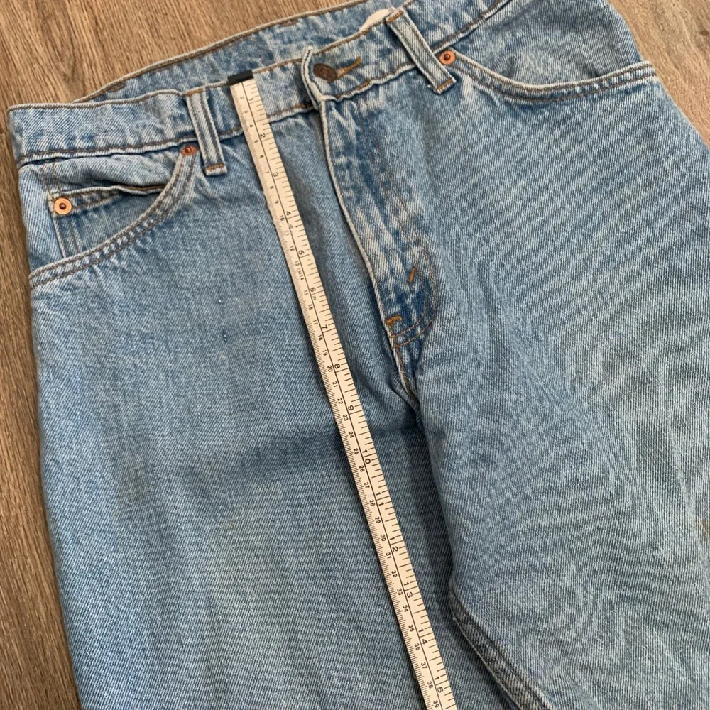 Vintage 80s Levi's 550 orange tab tapered leg denim jeans in light wash - 30x30‎